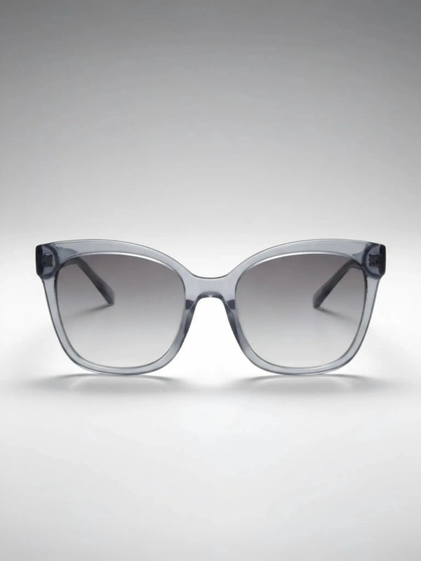 Sunglasses with a gradient lens on a light gray background
