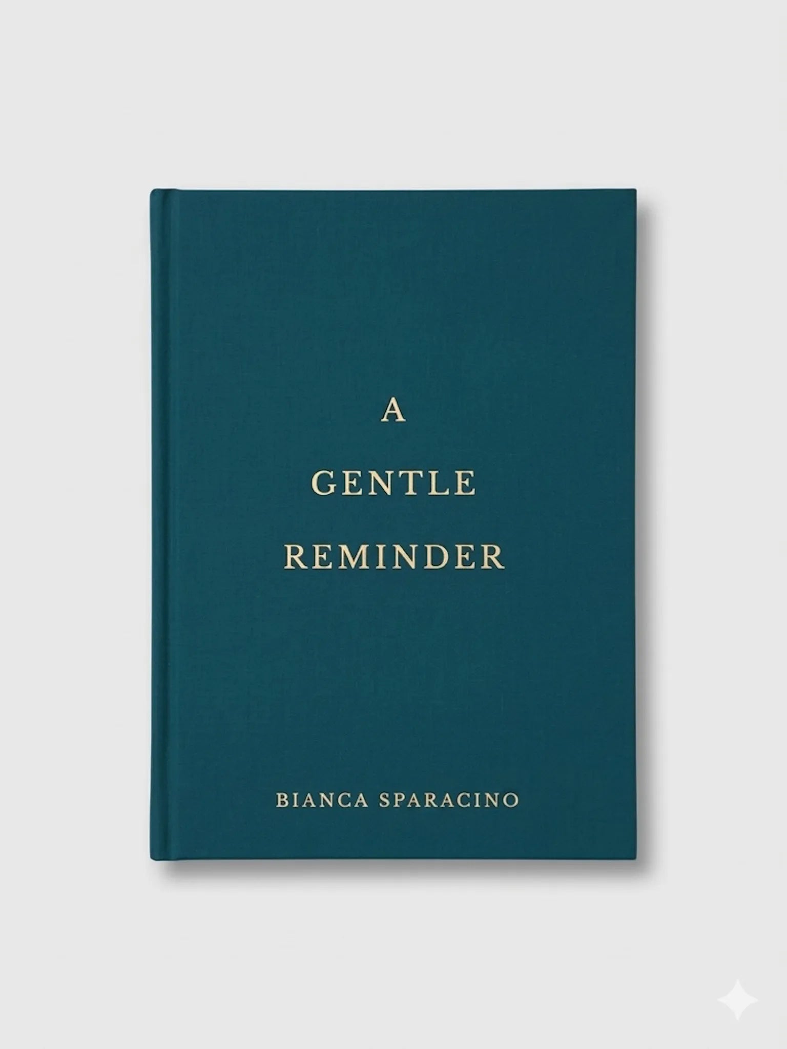 Book titled 'A Gentle Reminder' by Bianca Sparacino on a light gray background