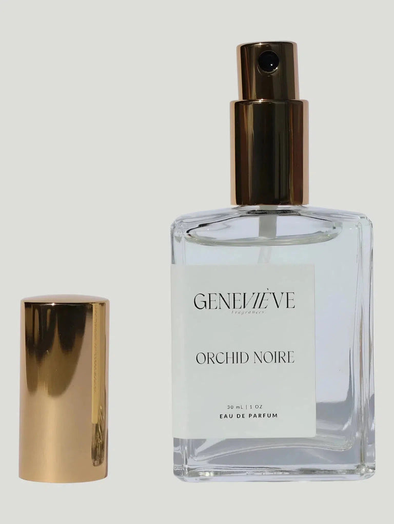 Indulge in the opulence of Orchid Noire Eau De Perfume by Geneviève, exclusively at Queen Anna House of Fashion. Revel in a fusion of exotic scents in a 30 mL bottle, epitomizing elegance and sophistication. Enjoy the luxury of free shipping and hassle-free returns. A fragrance that transcends, available now.