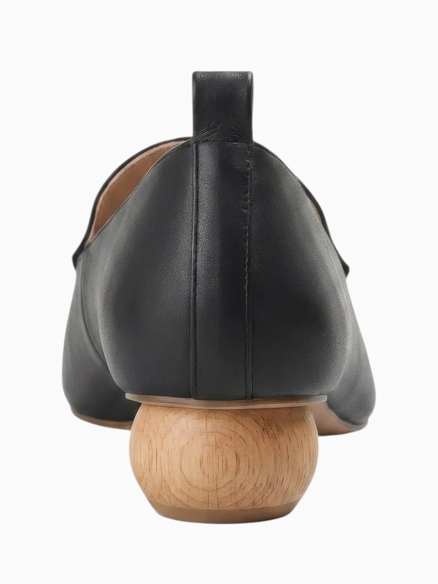 Queen Anna House of Fashion black leather loafer with a unique spherical wooden heel and pull tab.