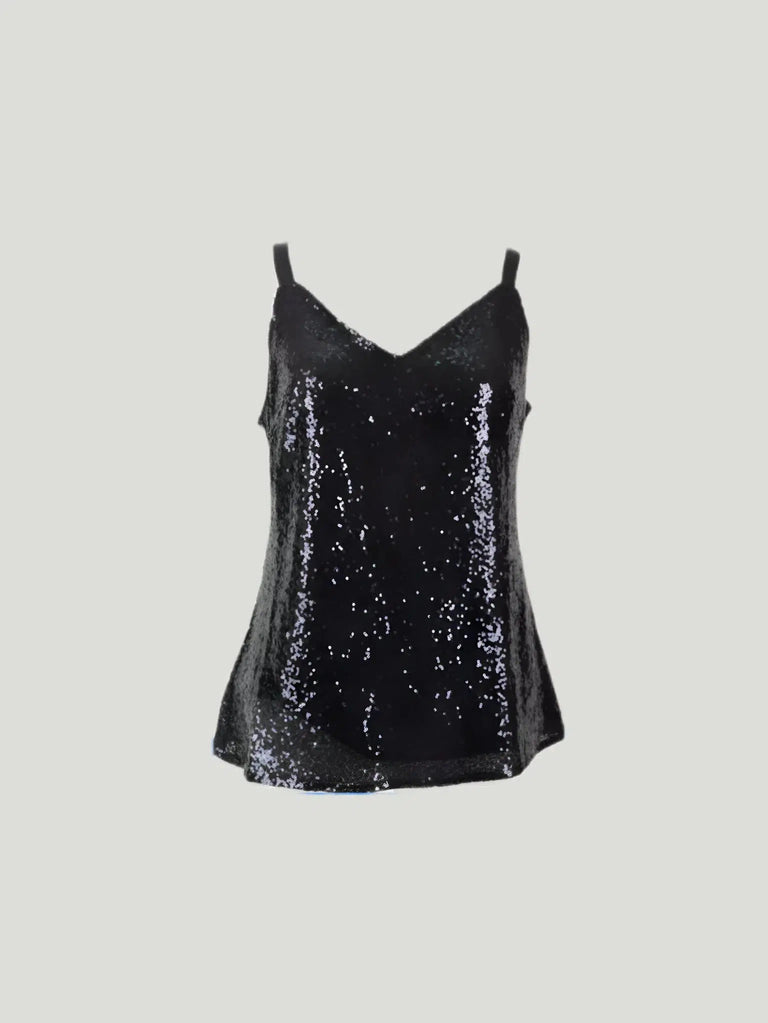 Illuminate your evenings with Kamare's Quinn Sequin Cami in Black. Perfectly designed to flatter, it blends comfort and dazzle and is sure to create allure. Make it your go-to for those special nights. Free shipping and returns apply. Certain limitations may apply.