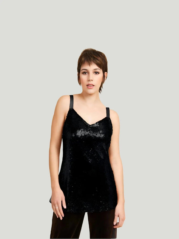 Illuminate your evenings with Kamare's Quinn Sequin Cami in Black. Perfectly designed to flatter, it blends comfort and dazzle and is sure to create allure. Make it your go-to for those special nights. Free shipping and returns apply. Certain limitations may apply.