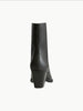 Black knee-high boot on a white background