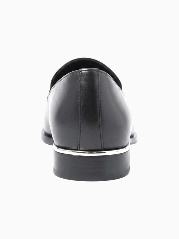 Queen Anna House of Fashion black leather loafers with silver trim detail on heel and structured toe.