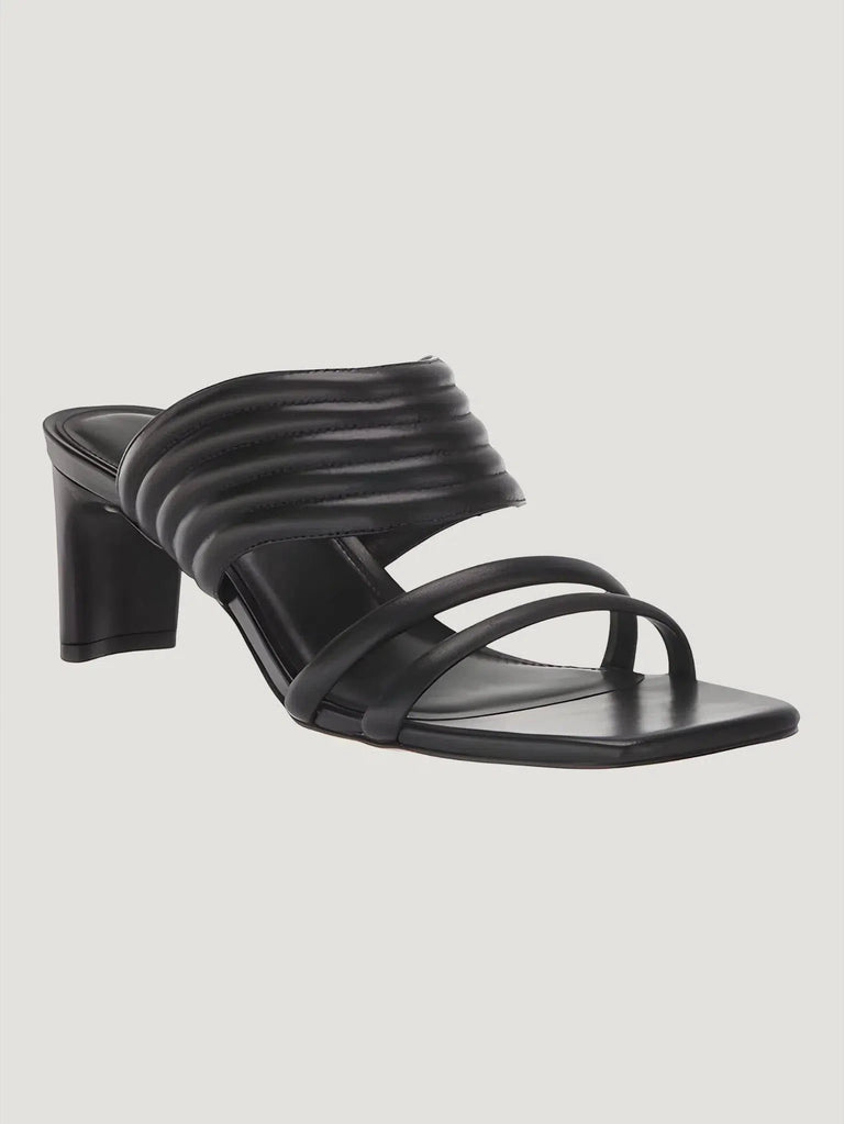 Experience unparalleled comfort with the Rebecca Allen Pillow Sandal in Black, available at Queen Anna House of Fashion. This versatile sandal features a leather upper, cushioned insole, and a stylish 2.5-inch heel. Ideal for any occasion, day or night. Shop now with free shipping and returns.