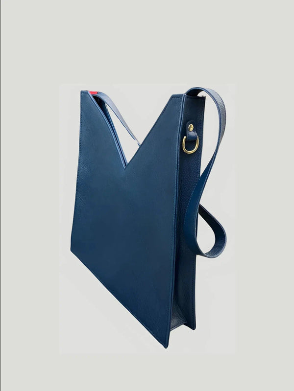 The Vie Tote is a handcrafted bag made from full-grain leather and with solid brass hardware. This tote offers a lifetime of style and functionality. Designed in Portland and backed by a lifetime guarantee. Shop this and much more risk-free with free shipping and returns; certain limitations may apply.