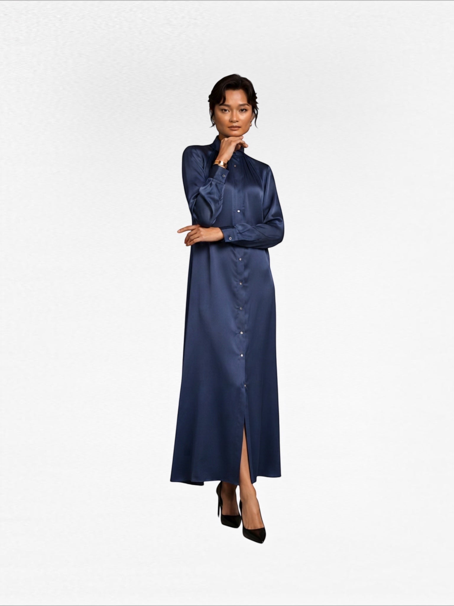 The Camilla Dress by Neu Nomads is constructed from 100% Satin TENCEL™ Modal, with a refined polo collar, long sleeves, and a button-up shirt dress silhouette featuring a 2-inch belt. Biodegradable mother of pearl shell buttons and French seam finishing complete the garment.