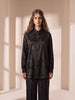 Model wearing a Queen Anna House of Fashion black satin button-down shirt with a subtle tonal animal print pattern.