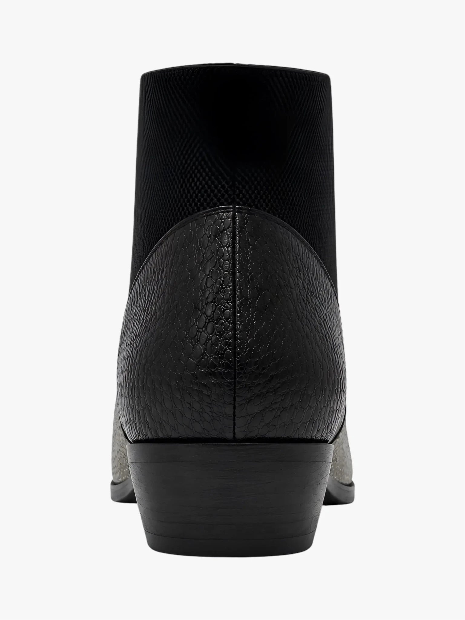 United Nude Zink Patch Booties: architectural black mixed-texture leather with chunky rubber sole.