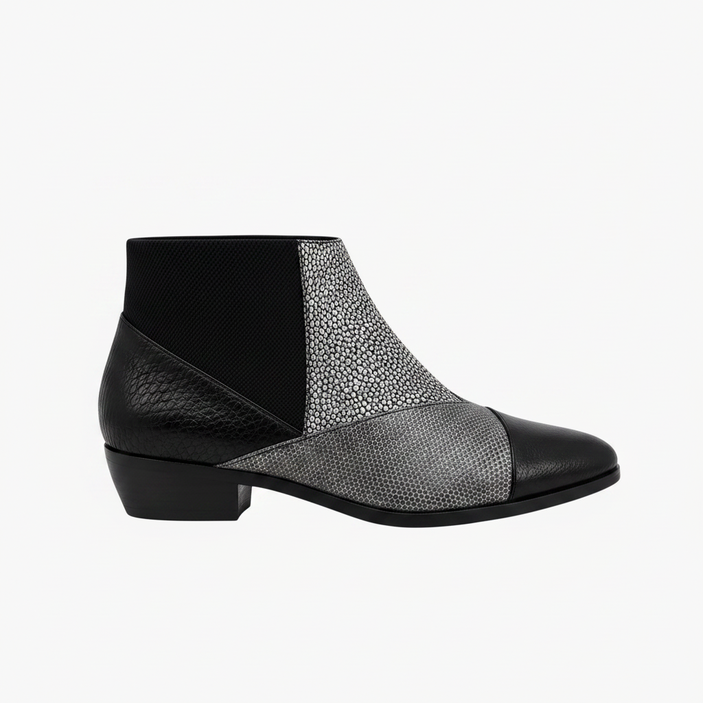United Nude Zink Patch Booties: Architectural black & silver mixed-texture leather ankle boots with chunky rubber sole.
