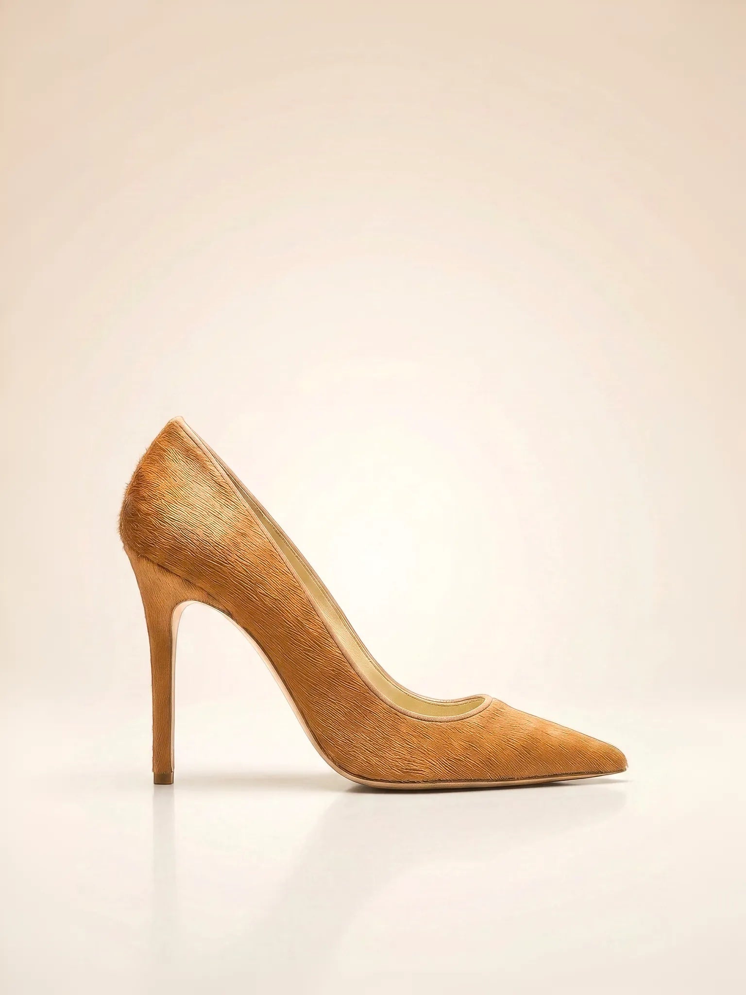 CHRISTINA LOMBARDI Kersen tan ponyhair pointed-toe stiletto pump. Genuine leather.
