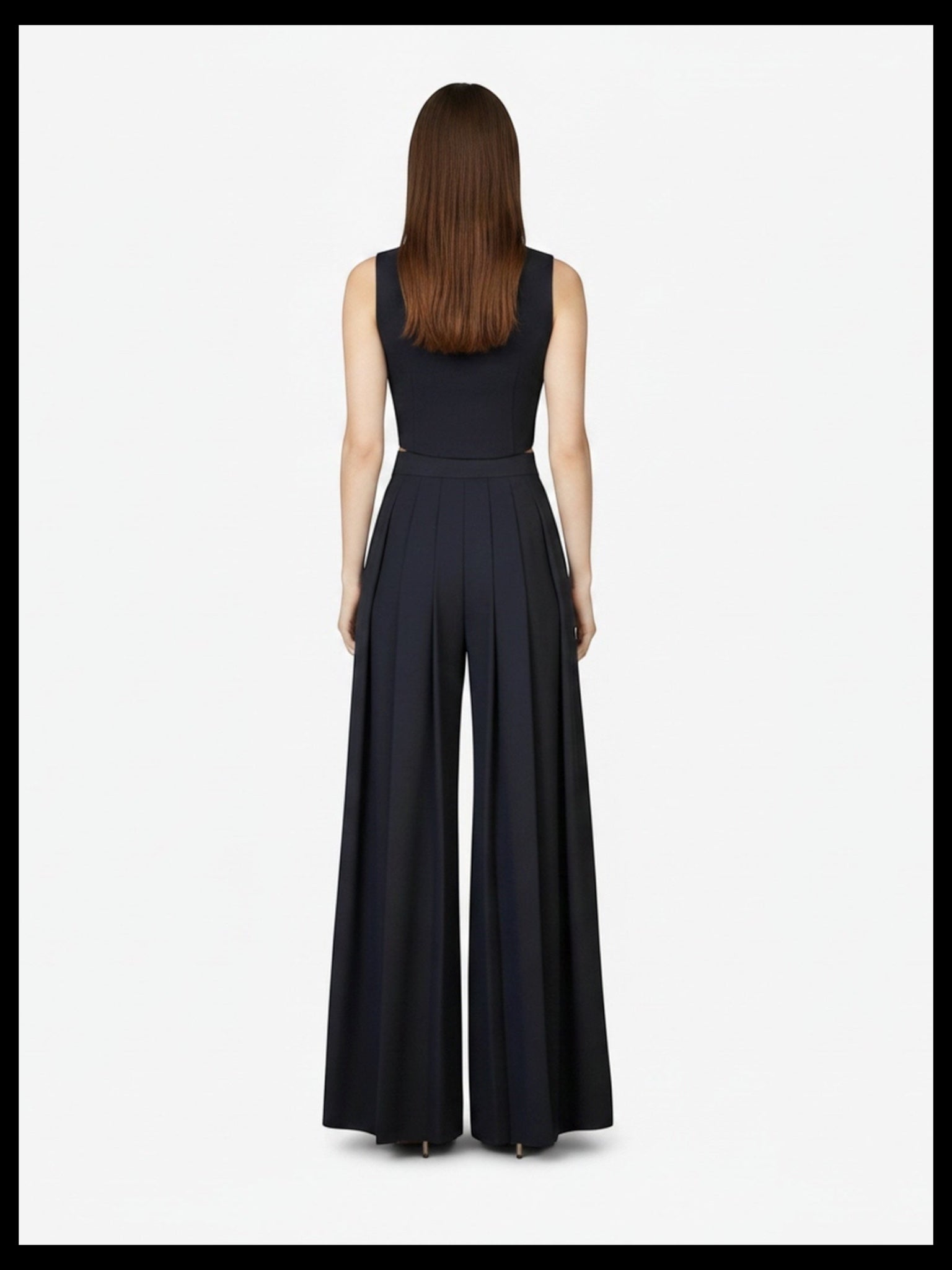 Rear view of model wearing Article X Black Wide Leg Pant and crop top, highlighting high-waisted fit and back silhouette