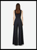 Rear view of model wearing Article X Black Wide Leg Pant and crop top, highlighting high-waisted fit and back silhouette