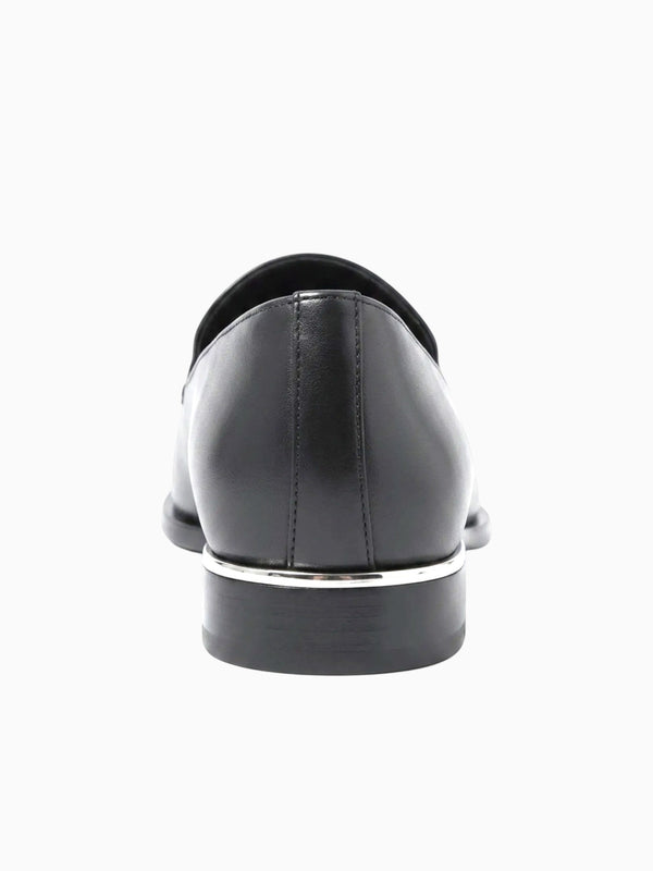 Queen Anna House of Fashion black leather loafers with silver trim detail on heel and structured toe.