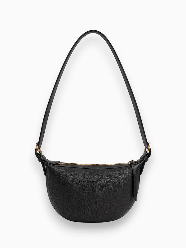 Queen Anna House of Fashion TAH Bags Nova black full-grain leather sling bag with adjustable strap and brass hardware.