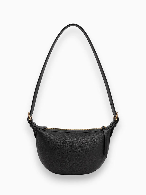 Queen Anna House of Fashion TAH Bags Nova black full-grain leather sling bag with adjustable strap and brass hardware.