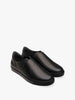 Queen Anna House of Fashion black leather utilitarian minimal sneakers with a sleek silhouette and durable sole.