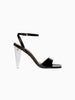 Queen Anna House of Fashion black leather heeled sandals with a transparent lucite block heel and ankle strap.
