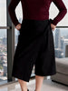 Queen Anna House of Fashion black linen wrap culottes with a wide-leg cropped silhouette and side tie detail.