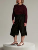 Queen Anna House of Fashion Universal Standard black linen wrap culottes with wide-leg cropped fit on a model