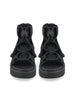 Queen Anna House of Fashion black Nappa leather and neoprene Nomadic Lo sandals with adjustable velcro ankle strap and foam rubber outsole.