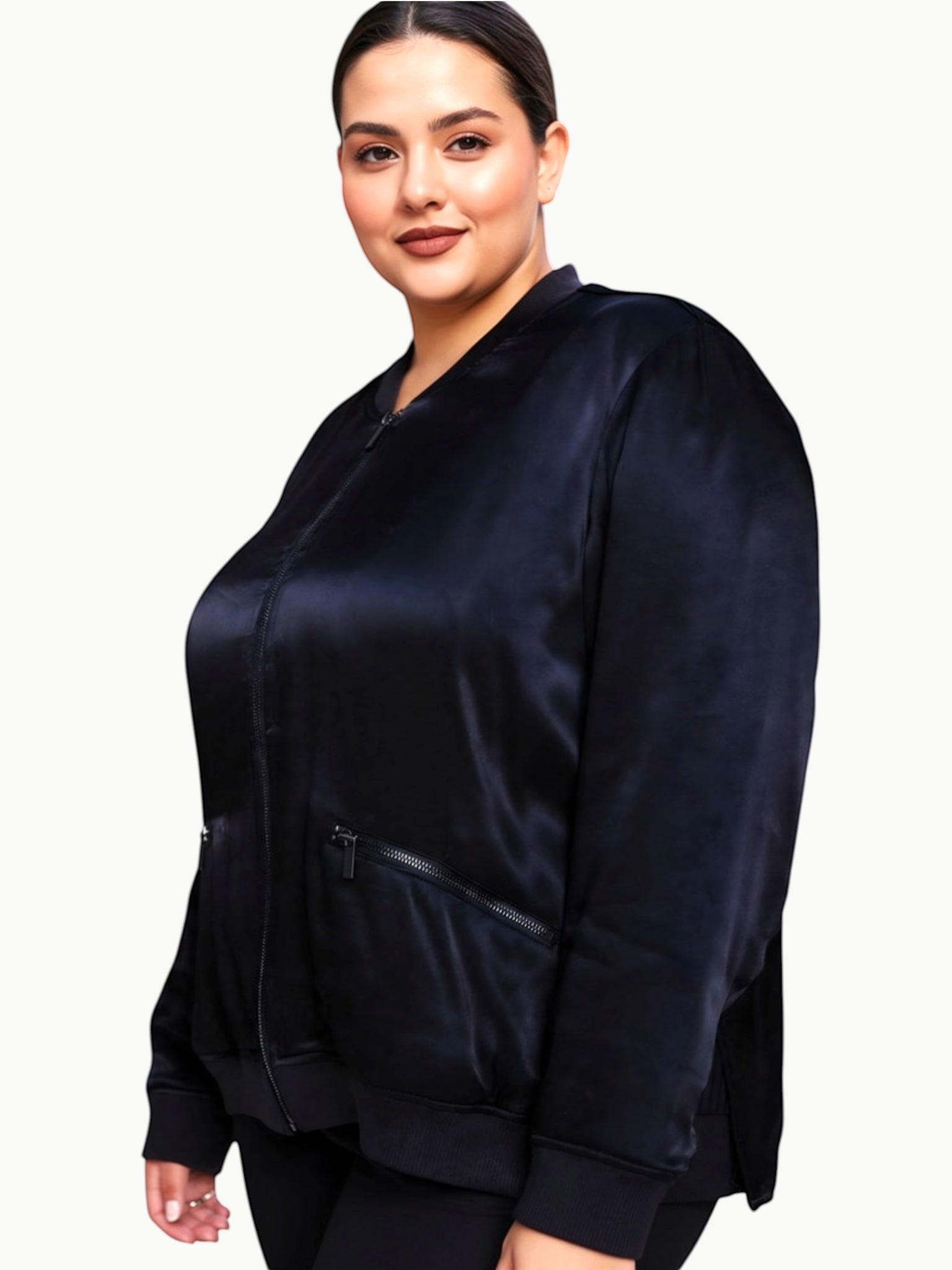 Queen Anna House of Fashion model wearing a black satin bomber jacket with zip pockets and tonal rib trim
