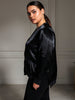 Model wearing a black Queen Anna House of Fashion satin bomber jacket with a high-low hem and zip pockets.