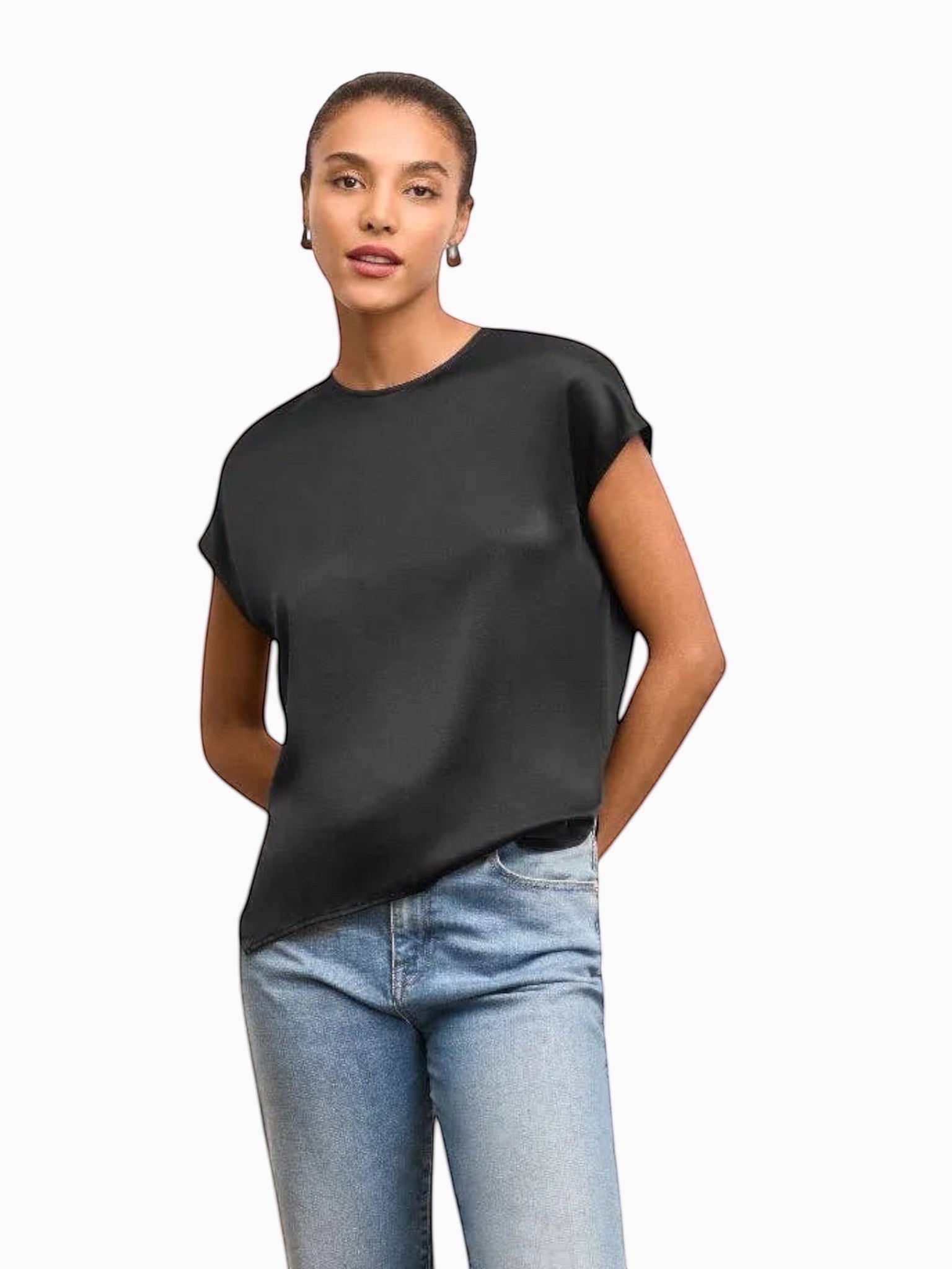 Model wearing a black Queen Anna House of Fashion washable silk charmeuse blouse with a relaxed, fluid silhouette.