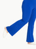 Queen Anna House of Fashion model wearing a vibrant blue Universal Standard Mola pull-on pant with a straight-leg fit.