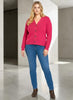 Model wearing a Queen Anna House of Fashion pink Better Than Wool cardigan with a V-neck and button-front closure.