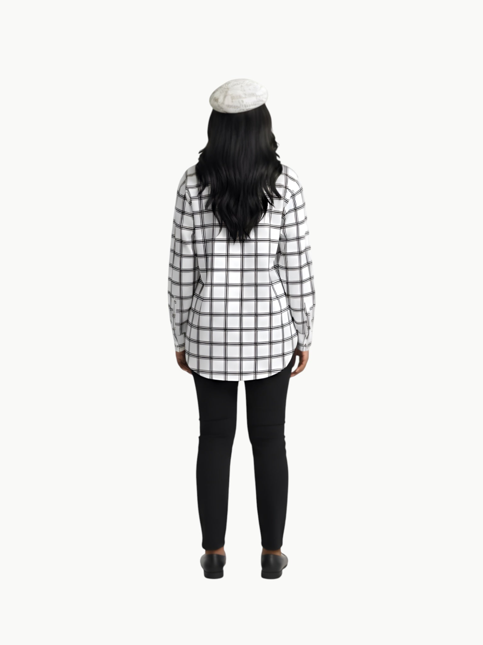 Queen Anna House of Fashion model wearing a white and black plaid poplin shirt with black trousers and a beret.