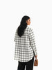 Queen Anna House of Fashion white and black plaid button-down shirt worn by a model from the back view