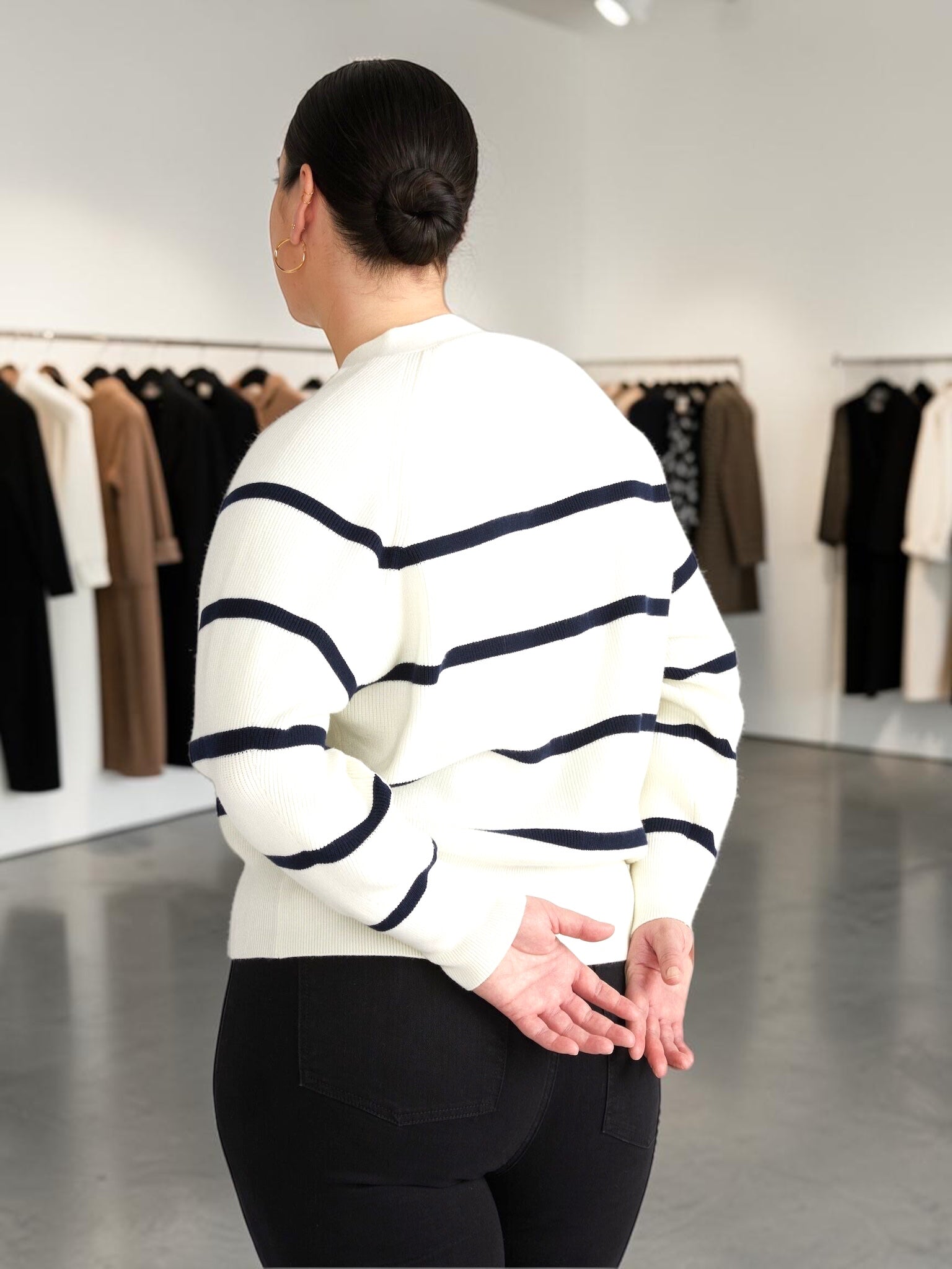 Queen Anna House of Fashion Universal Standard cream and navy striped Better Than Wool cardigan worn by a model
