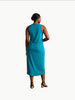 Queen Anna House of Fashion model wearing a teal Universal Standard Cai high neck tank dress in soft cotton jersey.
