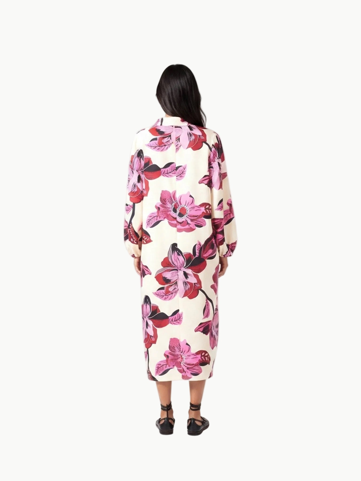 Rear view of model wearing Lanhtropy Sake Linen Tencel Dress in floral print showing back view
